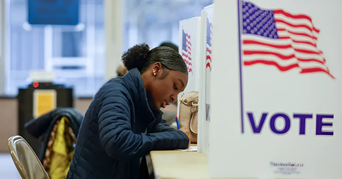A voter fills out her ballot for the U.S. presidential election.
Image Source: Al Jazeera