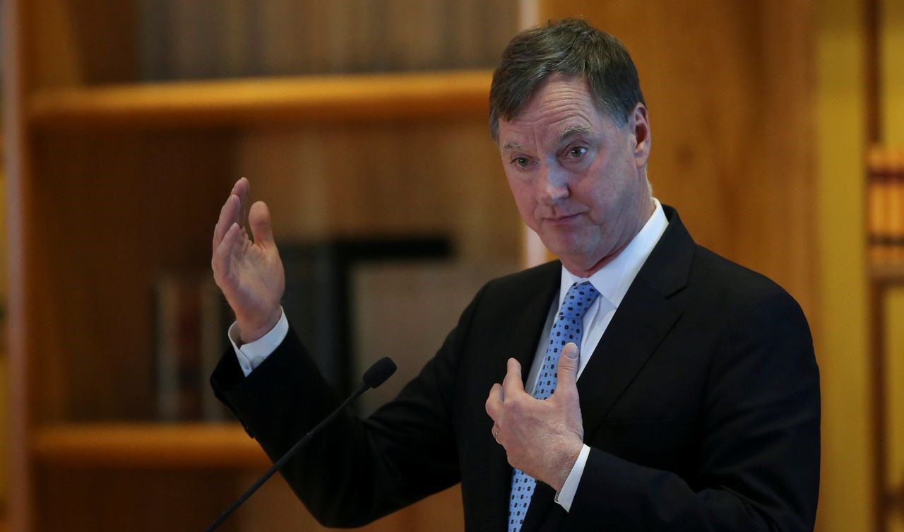 Fed official Evans is presenting his point view of inflation and taper